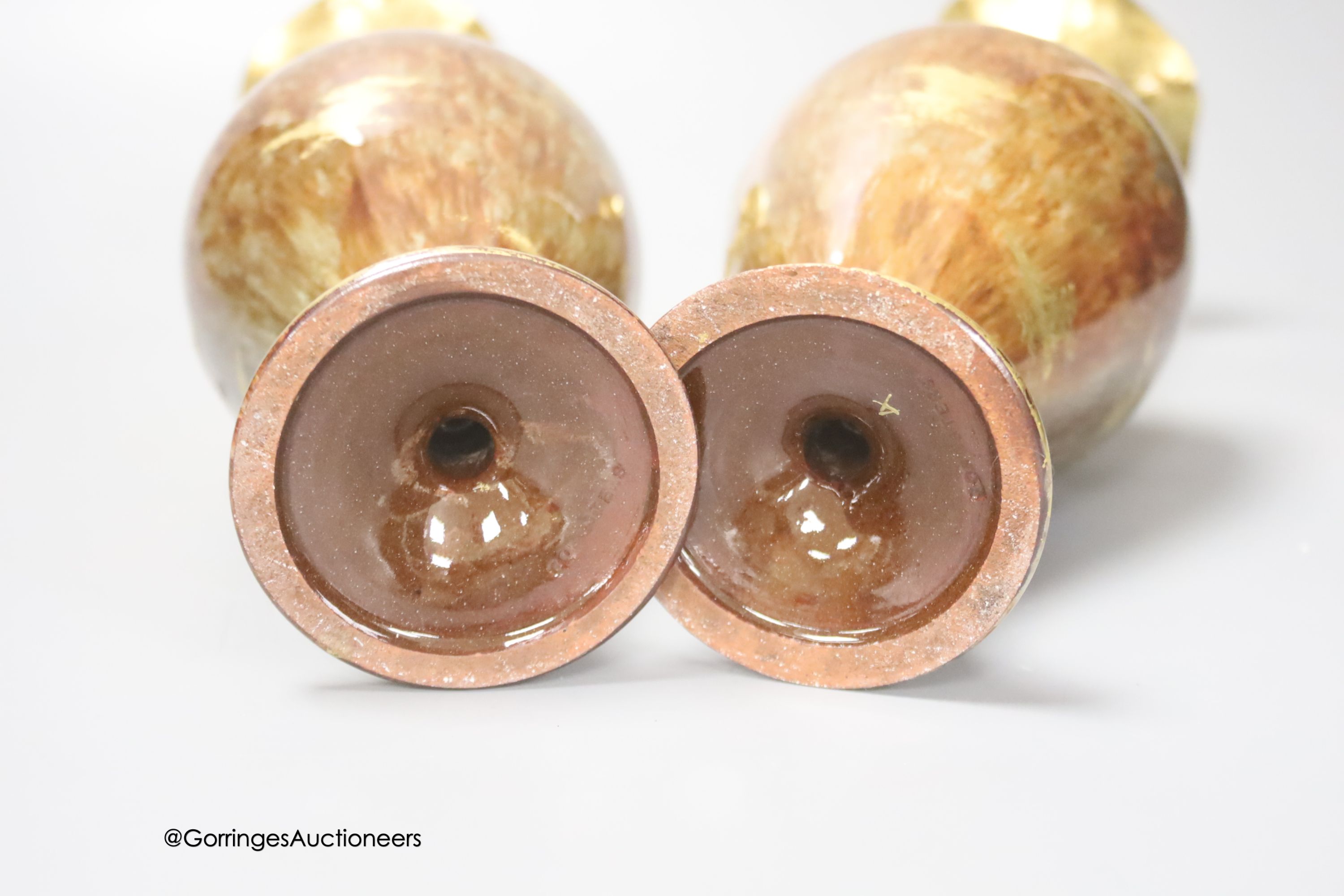 A pair of Forresters Aesthetic period gilded earthenware vases, 27cm